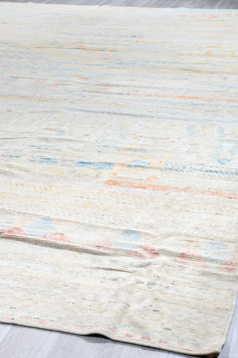 13' x 19' one-of-a-kind handmade vintage Tulu oversize rug. Color palette: ivory, pale blue, blush, sage, apricot, cream