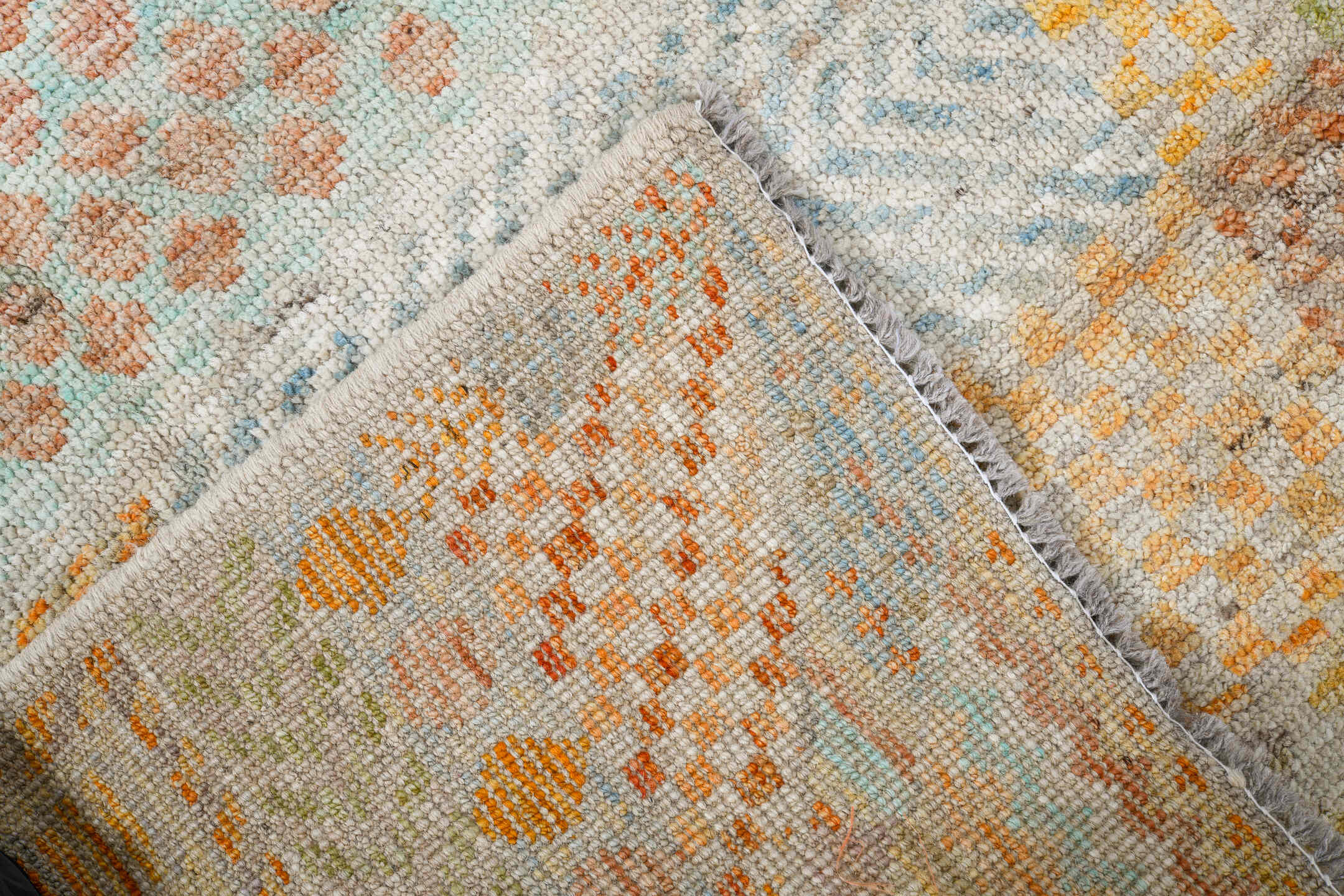4' x 6' one-of-a-kind handmade vintage Tulu small size rug. Color palette: ivory, pale aqua, apricot, sand, taupe