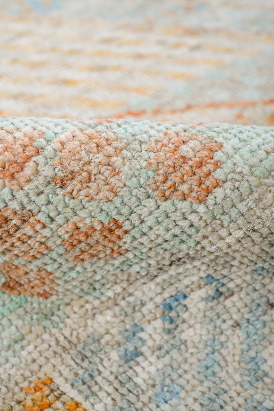 4' x 6' one-of-a-kind handmade vintage Tulu small size rug. Color palette: ivory, pale aqua, apricot, sand, taupe