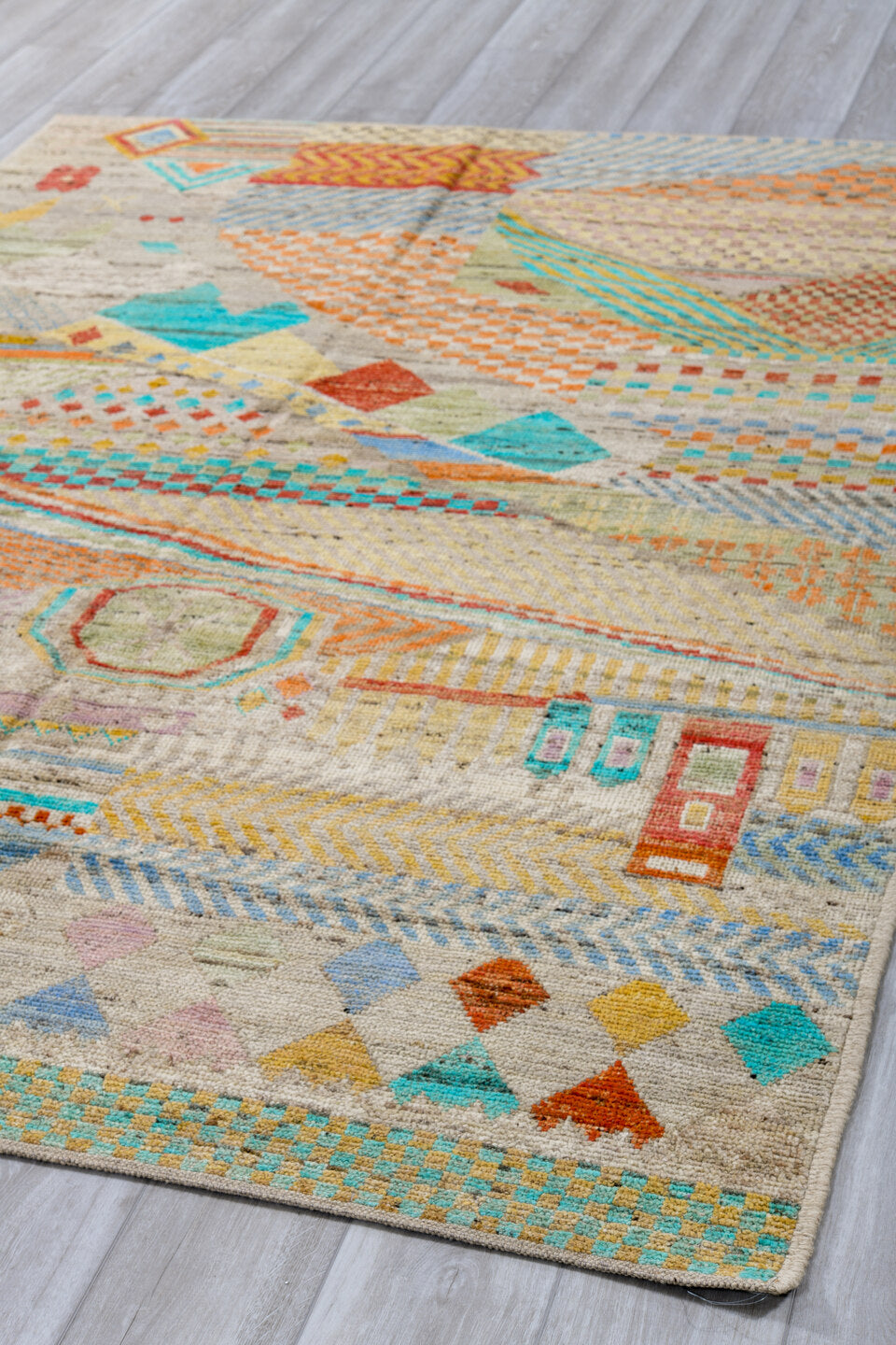 5' x 8' one-of-a-kind handmade vintage Tulu medium size rug. Color palette: ivory, coral, aqua, pale blue, sand, taupe