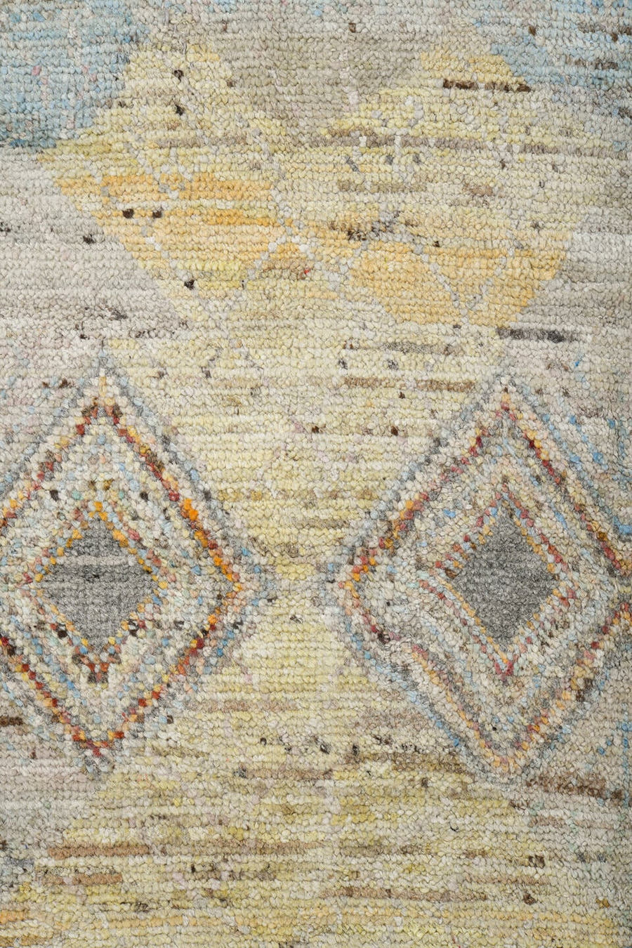 5' x 7' one-of-a-kind handmade vintage Tulu rug. Color palette: ivory, gray, terra cotta, pale blue, taupe, camel, sage