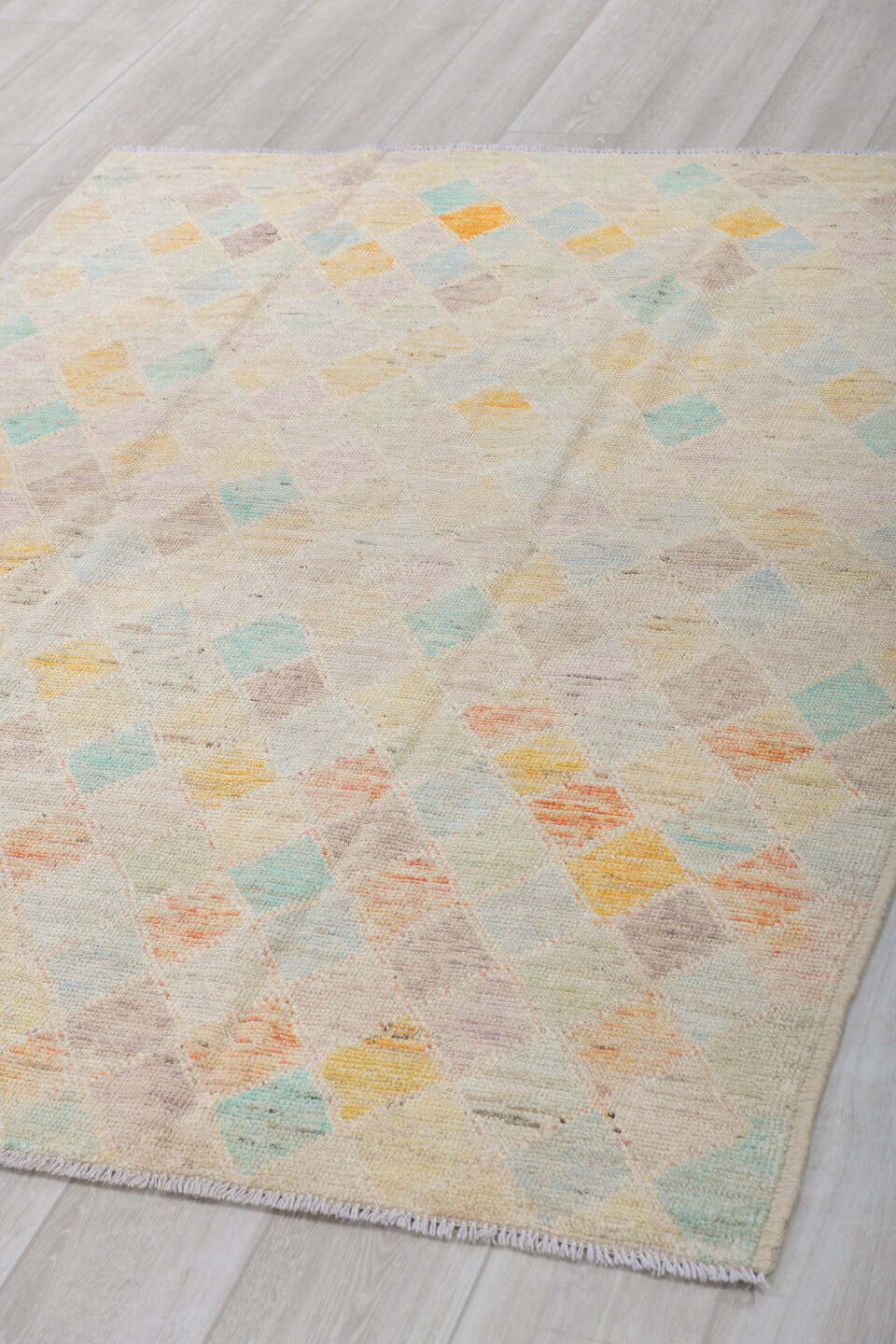5' x 6' one-of-a-kind handmade vintage Tulu rug. Color palette: ivory, cream, aqua, saffron, apricot, taupe, pale gray, teal