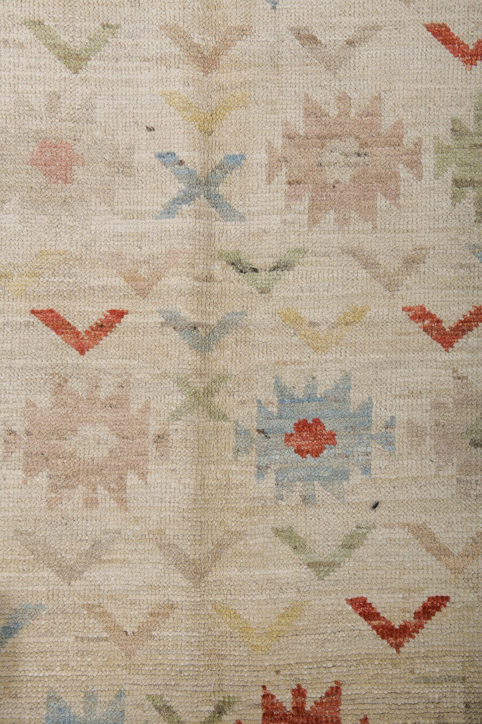 6' x 9' one-of-a-kind handmade vintage Tulu medium size rug. Color palette: ivory, rust, pale blue, blush, soft yellow, sage