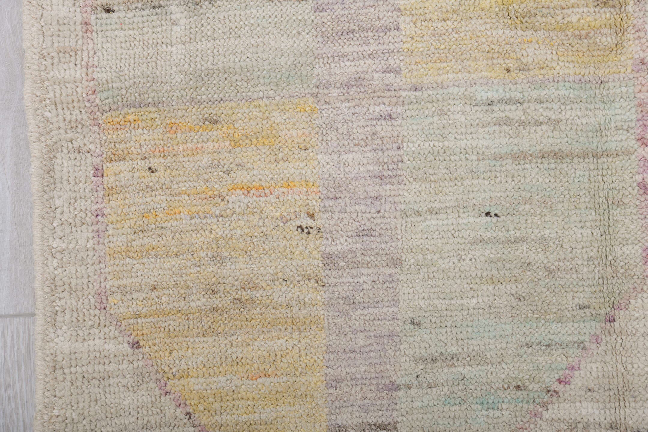5' x 6' one-of-a-kind handmade vintage Tulu rug. Color palette: ivory, sage, apricot, pale blue, butter, taupe, green