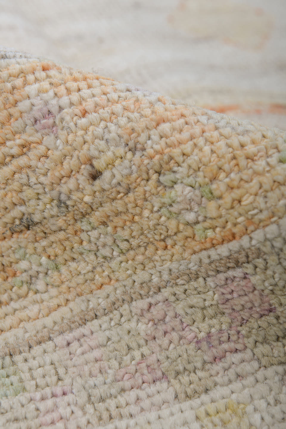 5' x 6' one-of-a-kind handmade vintage Tulu rug. Color palette: ivory, sage, apricot, pale blue, butter, taupe, green