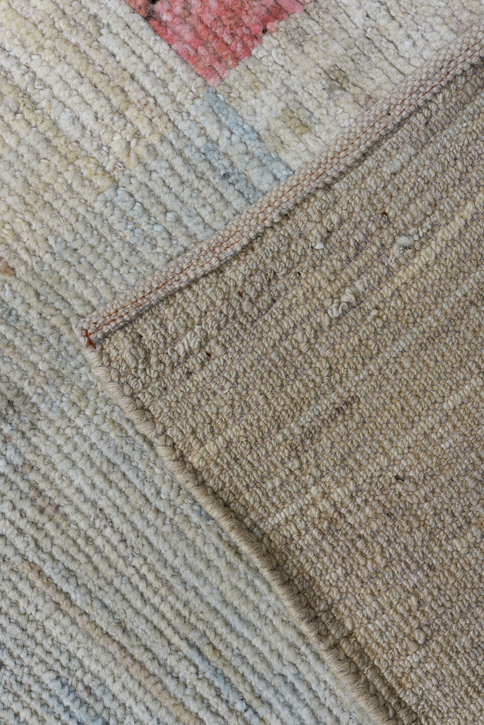 10' x 13' one-of-a-kind handmade vintage Tulu large size rug. Color palette: ivory, beige, blush, pale blue, cream