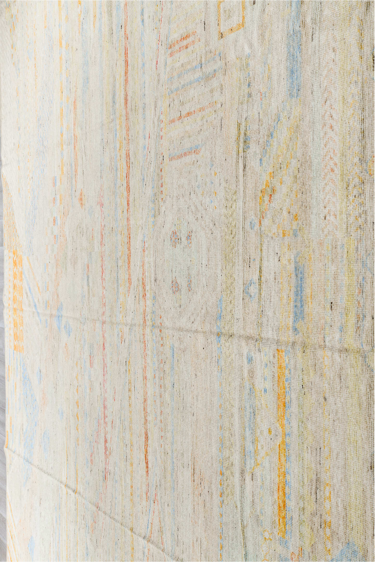13' x 16' one-of-a-kind handmade vintage Tulu oversize rug. Color palette: ivory, pale blue, cream, saffron, soft coral