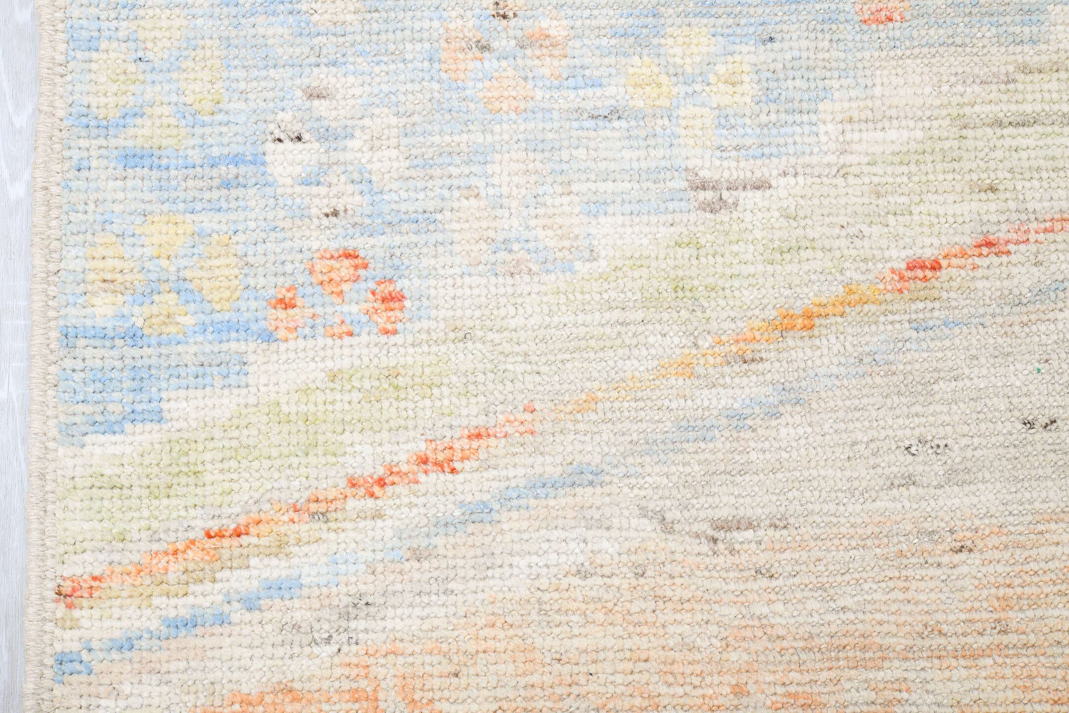 13' x 16' one-of-a-kind handmade vintage Tulu oversize rug. Color palette: ivory, pale blue, cream, saffron, soft coral