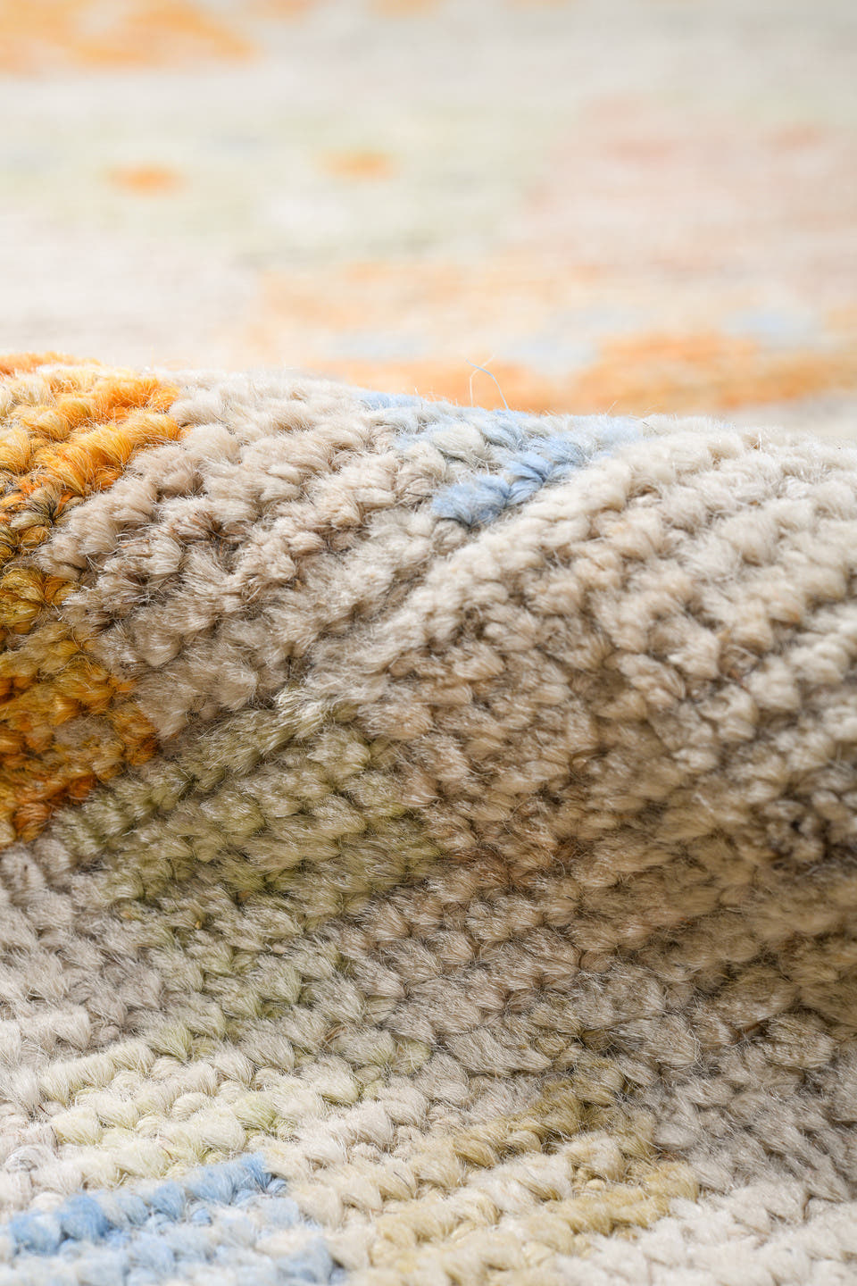 13' x 16' one-of-a-kind handmade vintage Tulu oversize rug. Color palette: ivory, pale blue, cream, saffron, soft coral