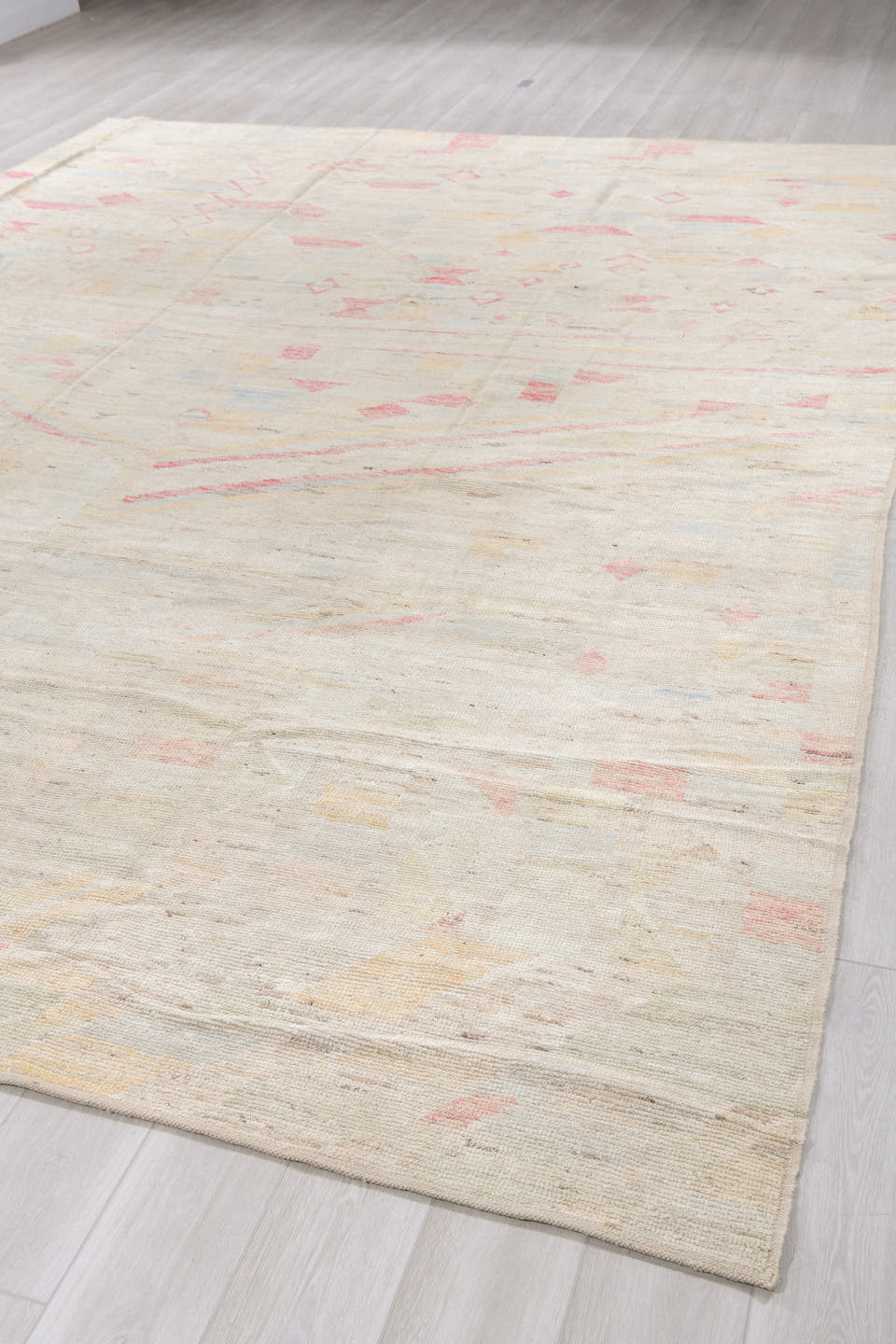 10' x 14' one-of-a-kind handmade vintage Tulu large size rug. Color palette: ivory, blush, pale gold, light blue, beige