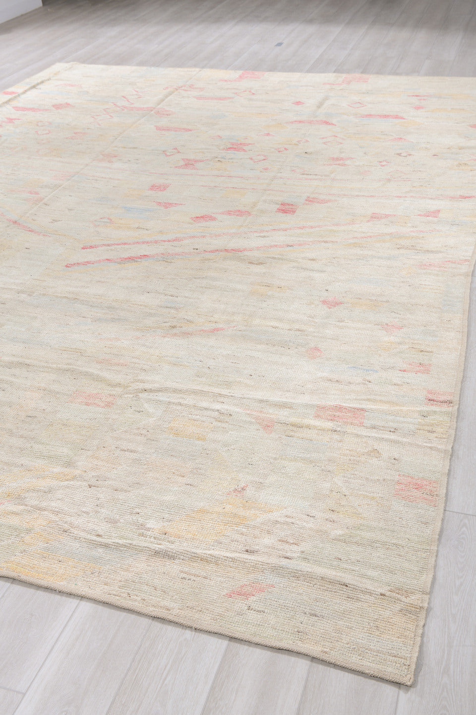 10' x 14' one-of-a-kind handmade vintage Tulu large size rug. Color palette: ivory, blush, pale gold, light blue, beige