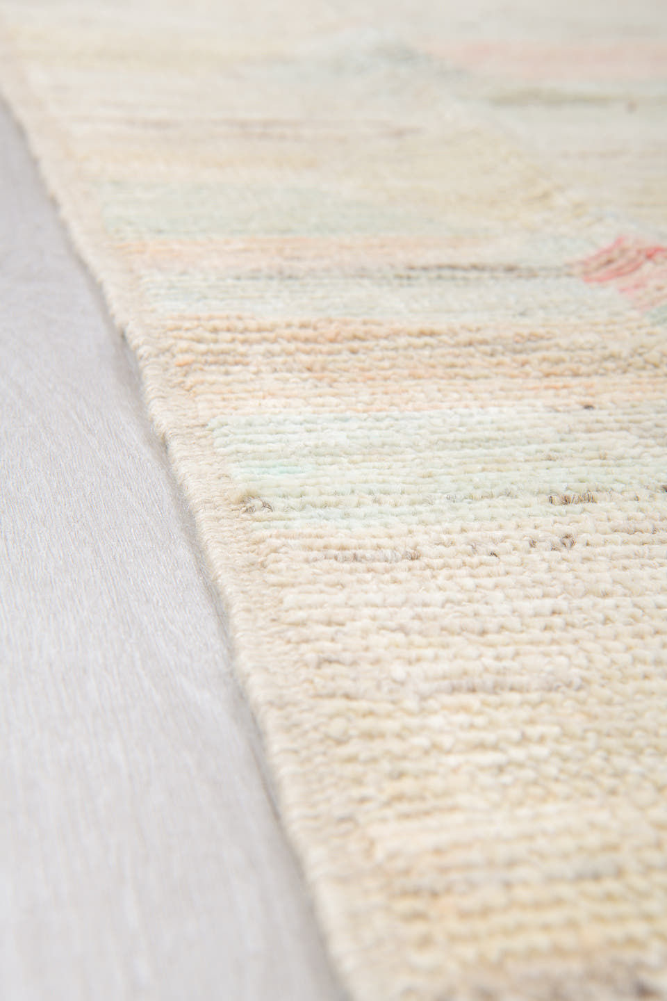 10' x 14' one-of-a-kind handmade vintage Tulu large size rug. Color palette: ivory, blush, pale gold, light blue, beige