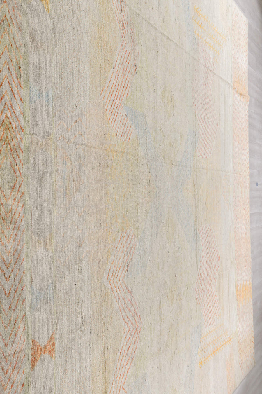 13' x 16' one-of-a-kind handmade vintage Tulu oversize rug. Color palette: ivory, blush, saffron, powder_blue, pale_gold