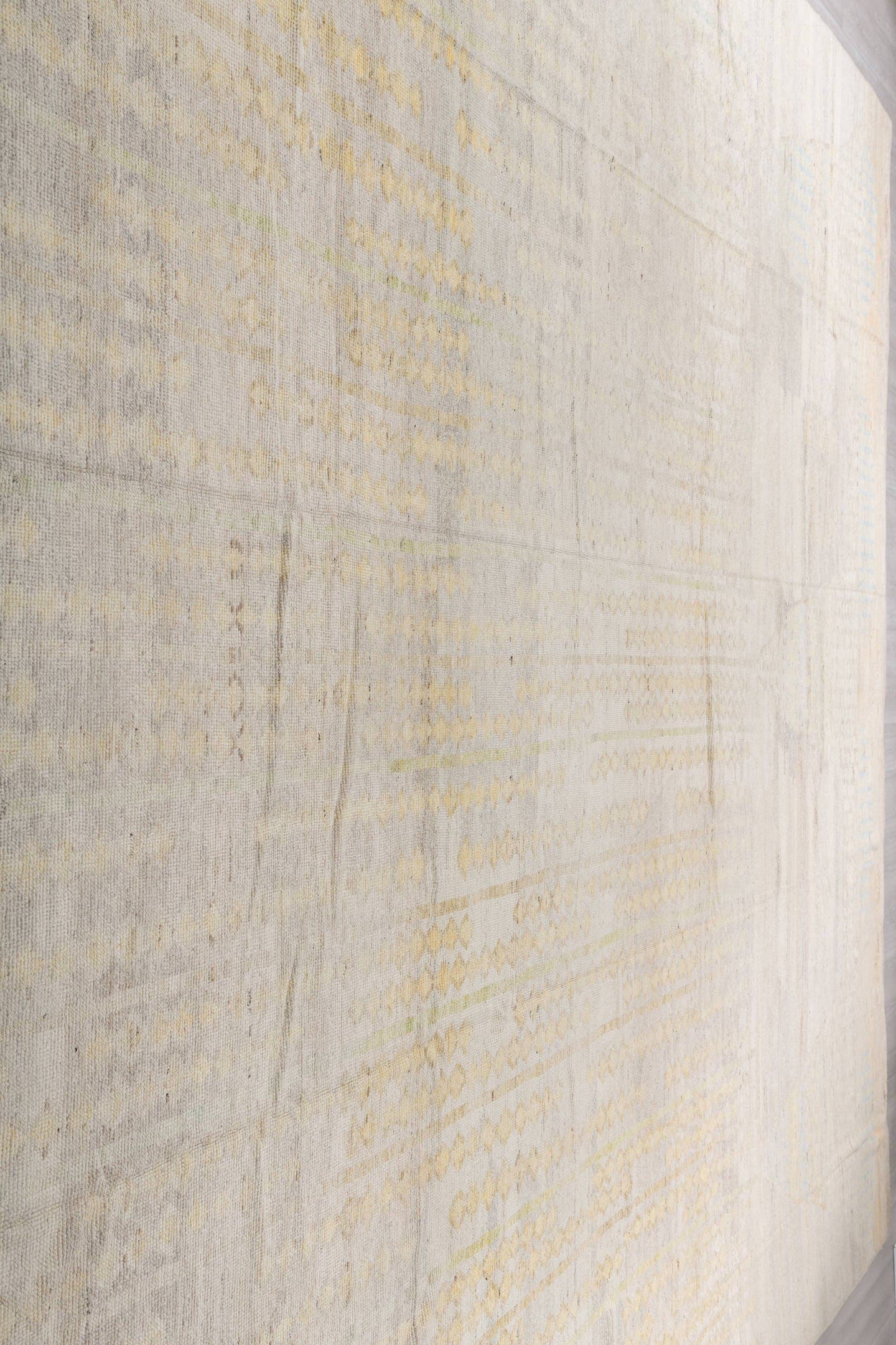 14' x 19' one-of-a-kind handmade vintage Tulu oversize rug. Color palette: ivory, cream, pale blue, soft gold, taupe, beige