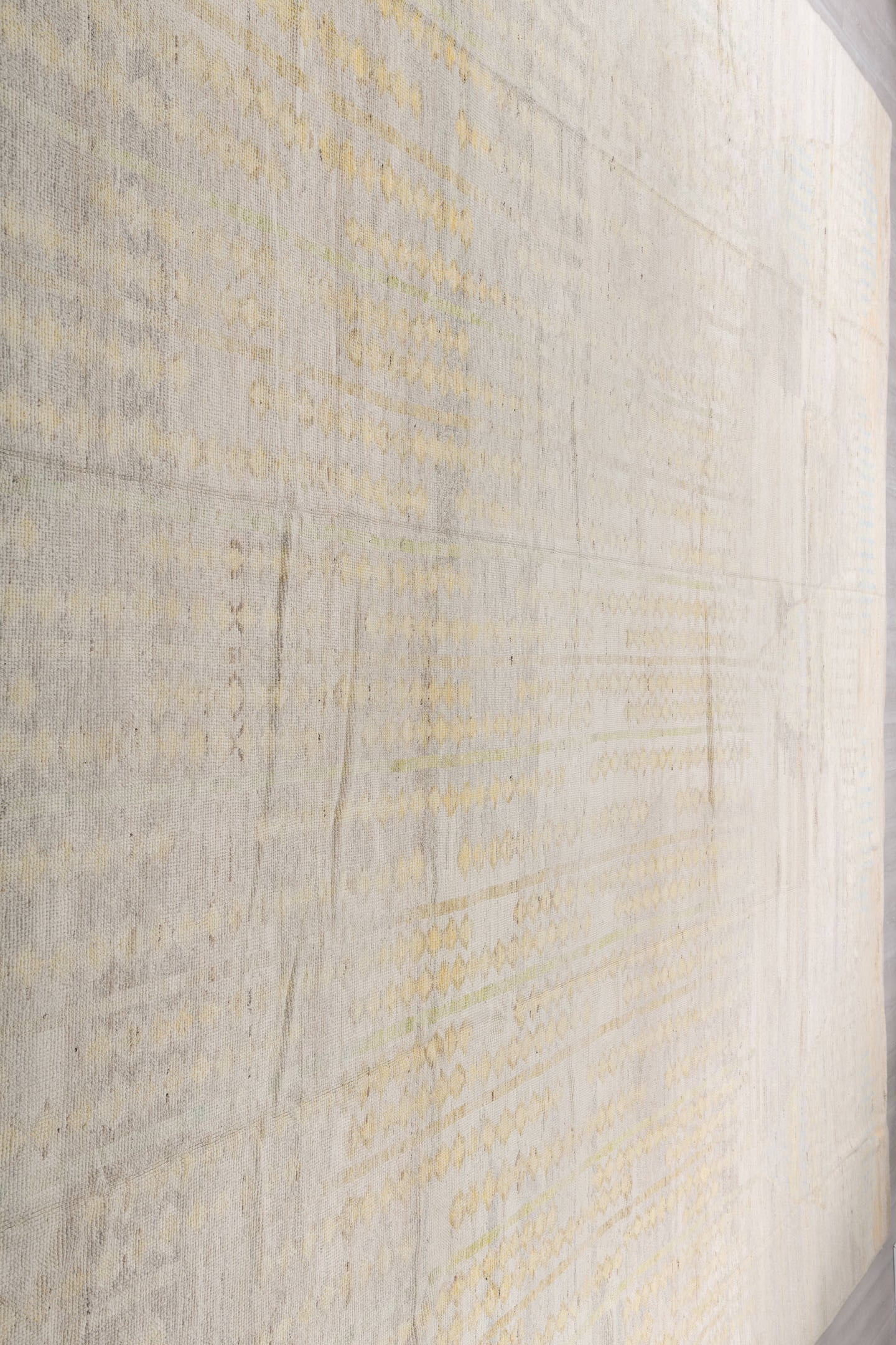 14' x 19' one-of-a-kind handmade vintage Tulu oversize rug. Color palette: ivory, cream, pale blue, soft gold, taupe, beige