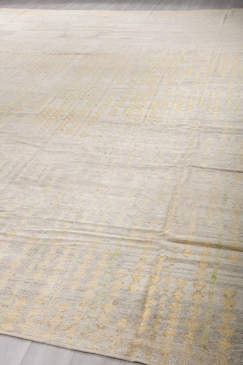 14' x 19' one-of-a-kind handmade vintage Tulu oversize rug. Color palette: ivory, cream, pale blue, soft gold, taupe, beige