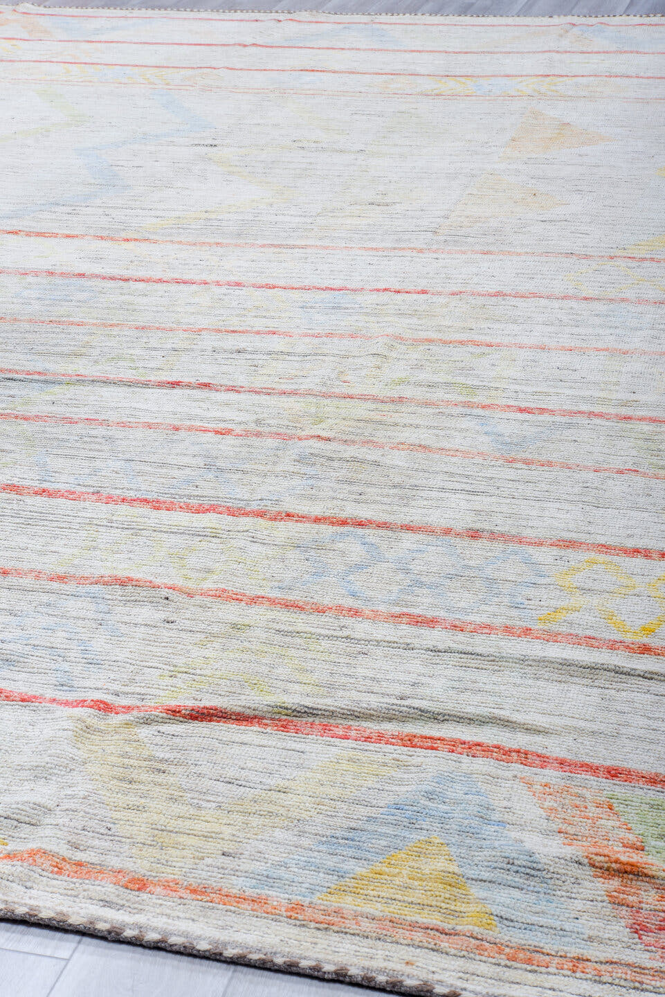 12' x 15' one-of-a-kind handmade vintage Tulu oversize rug. Color palette: ivory, coral, pale blue, butter yellow, sage