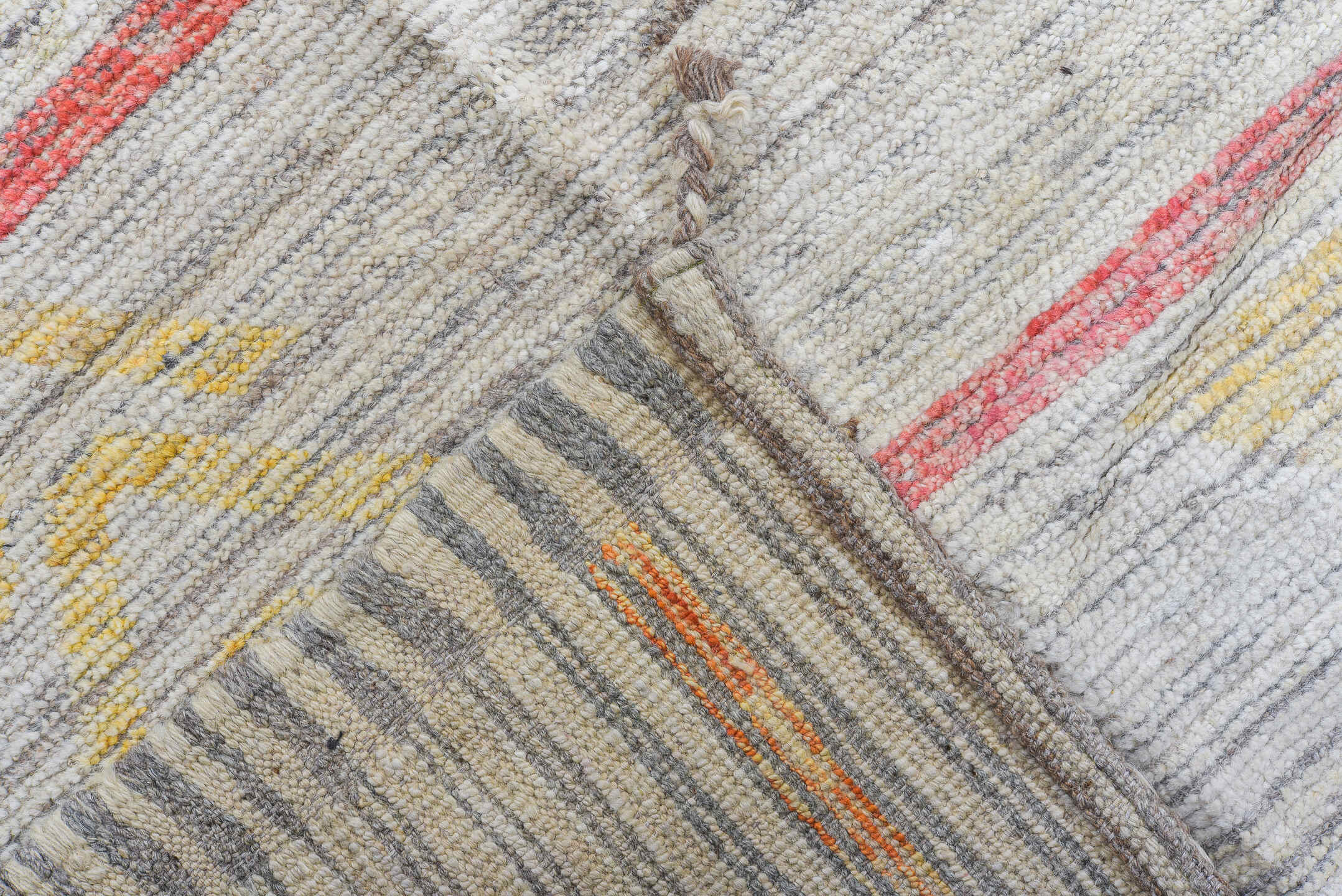 12' x 15' one-of-a-kind handmade vintage Tulu oversize rug. Color palette: ivory, coral, pale blue, butter yellow, sage