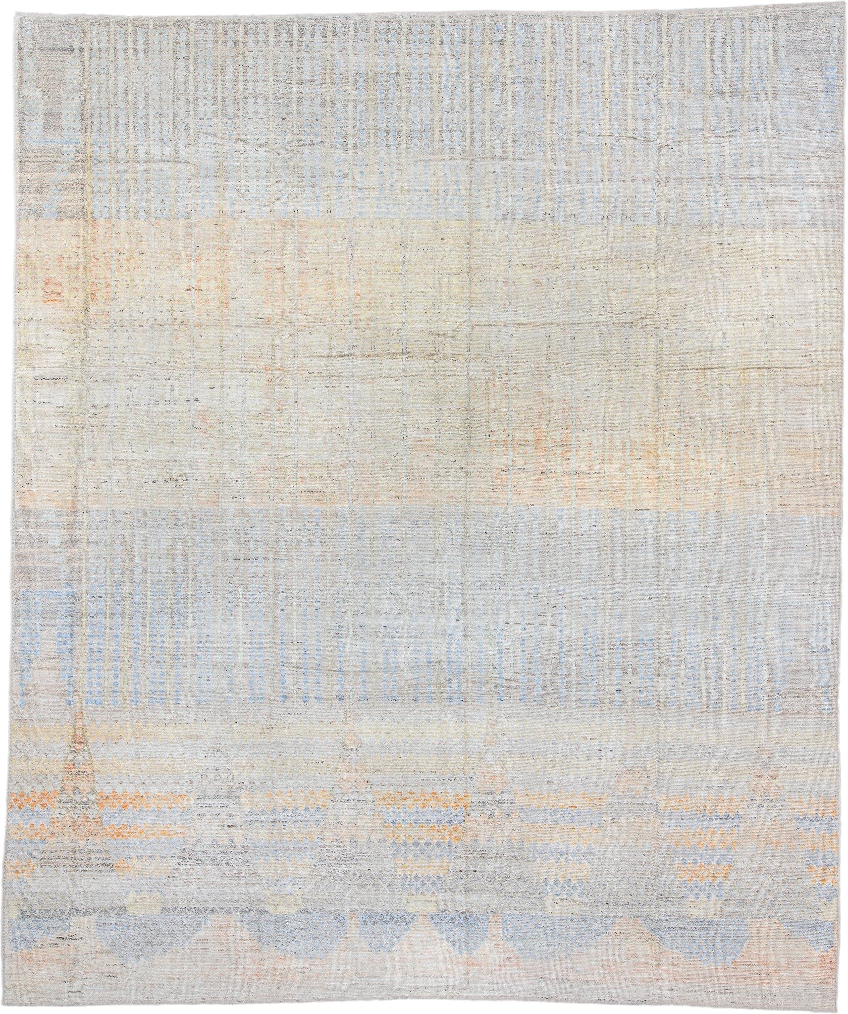 13' x 16' one-of-a-kind handmade vintage Tulu oversize rug. Color palette: ivory, pale blue, cream, peach, taupe, light gray