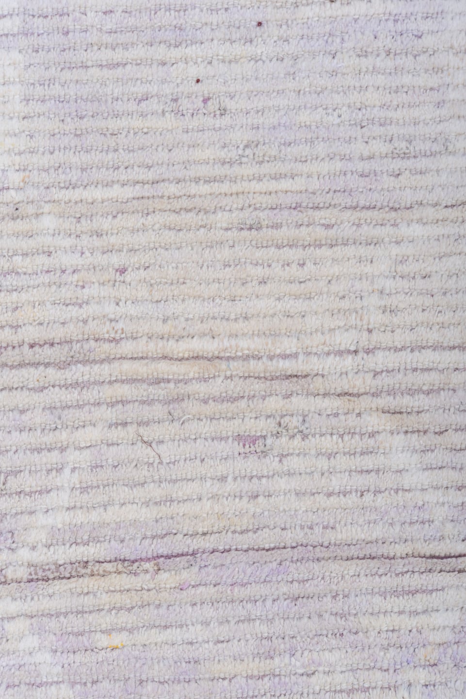 13' x 16' one-of-a-kind handmade vintage Tulu oversize rug. Color palette: ivory, pale lavender, taupe, cream, purple, pink
