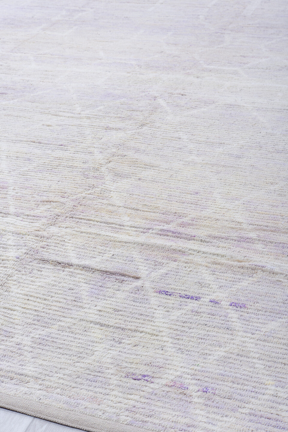 13' x 16' one-of-a-kind handmade vintage Tulu oversize rug. Color palette: ivory, pale lavender, taupe, cream, purple, pink