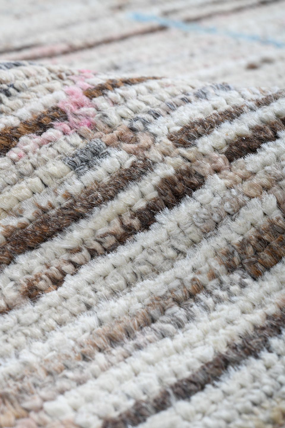 6' x 9' one-of-a-kind handmade vintage Tulu medium size rug. Color palette: ivory, taupe, brown, pink, pale_blue, gray