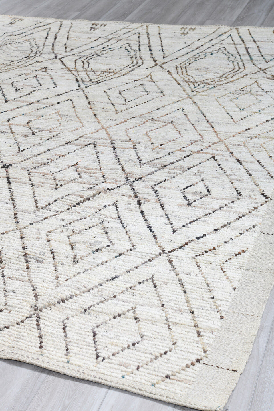 8' x 9' one-of-a-kind handmade vintage Tulu rug. Color palette: ivory, taupe, charcoal, gray, beige, black