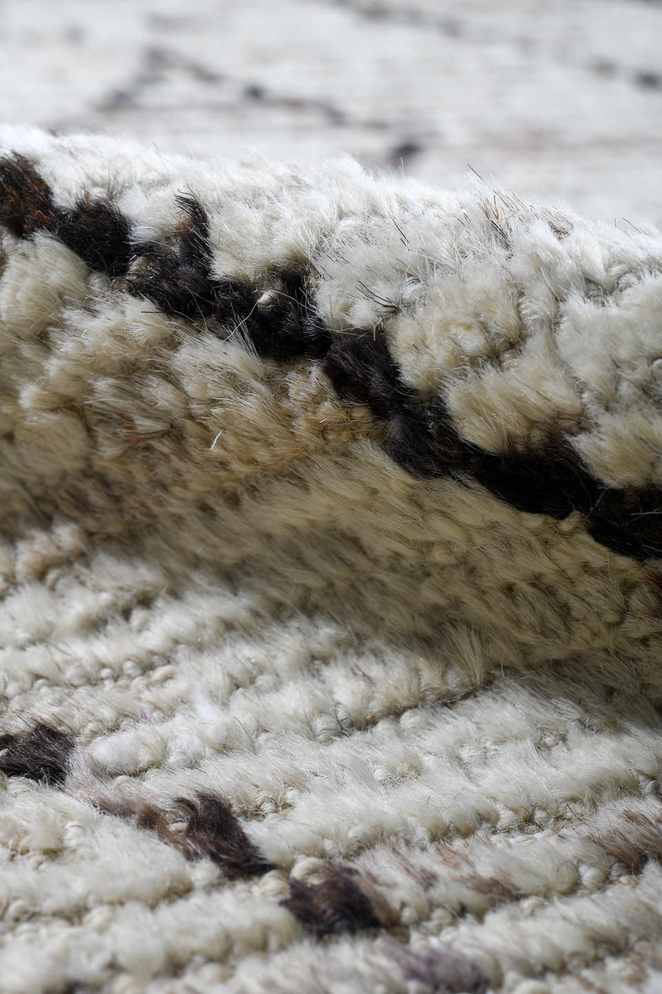 8' x 9' one-of-a-kind handmade vintage Tulu rug. Color palette: ivory, taupe, charcoal, gray, beige, black