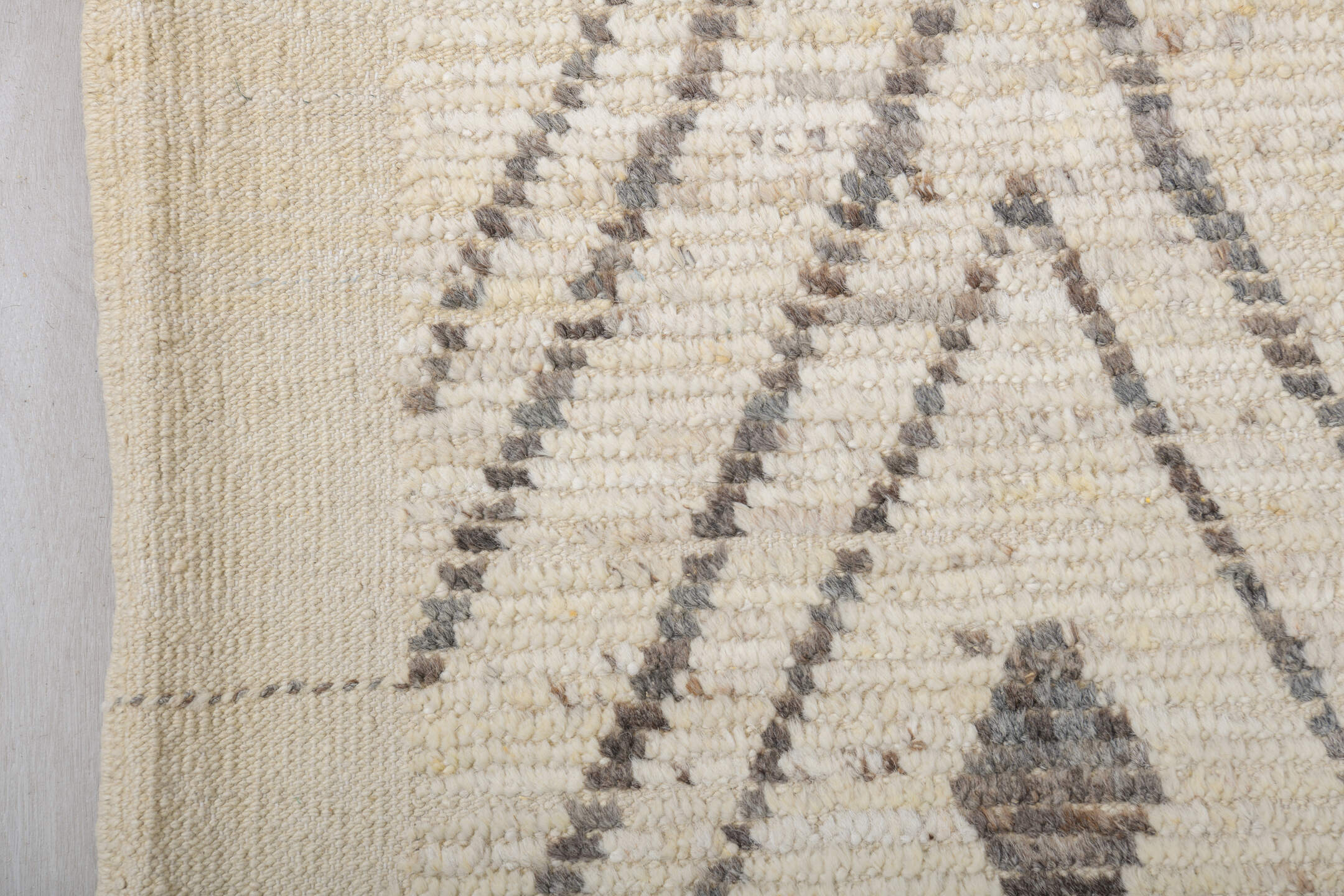 9' x 12' one-of-a-kind handmade vintage Tulu large size rug. Color palette: ivory, charcoal, cream, taupe, slate, black