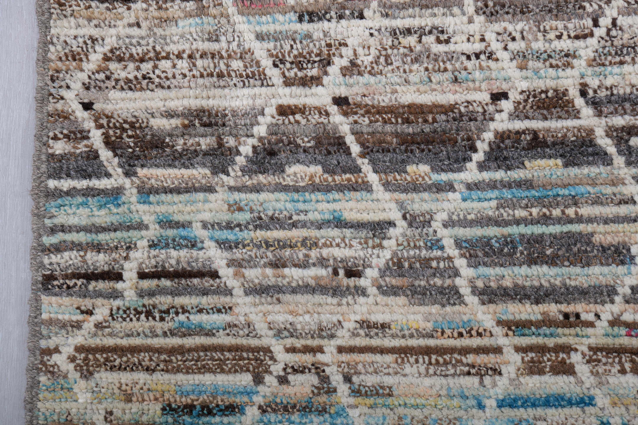 6' x 9' one-of-a-kind handmade vintage Tulu medium size rug. Color palette: ivory, taupe, brown, sky_blue, camel, slate