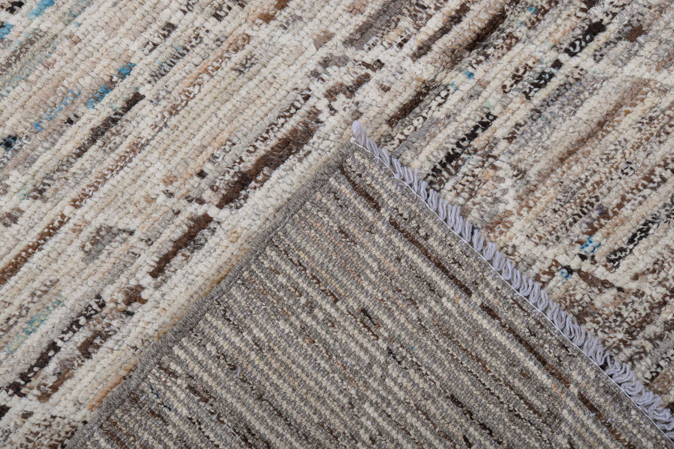 6' x 9' one-of-a-kind handmade vintage Tulu medium size rug. Color palette: ivory, taupe, brown, sky_blue, camel, slate
