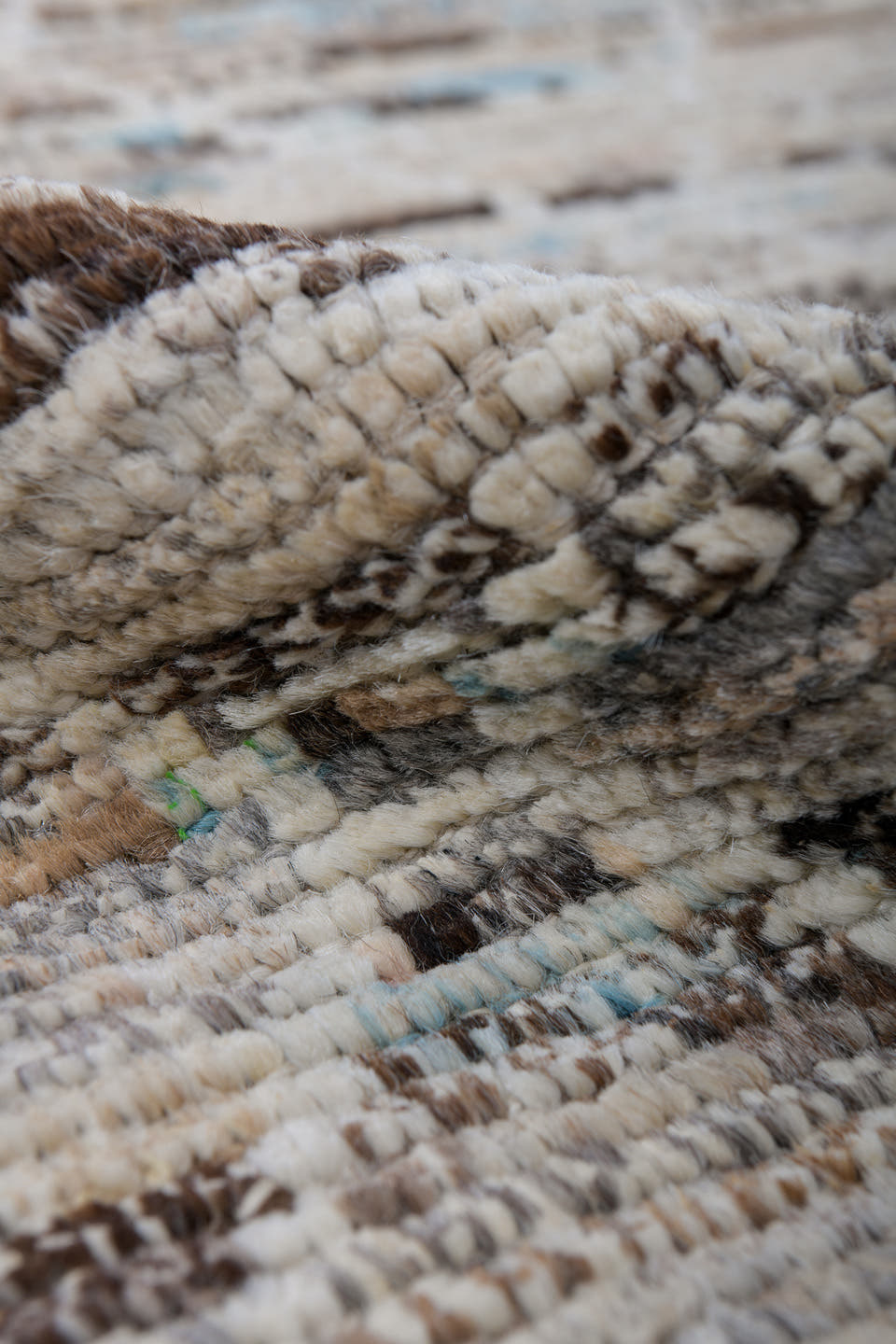 6' x 9' one-of-a-kind handmade vintage Tulu medium size rug. Color palette: ivory, taupe, brown, sky_blue, camel, slate