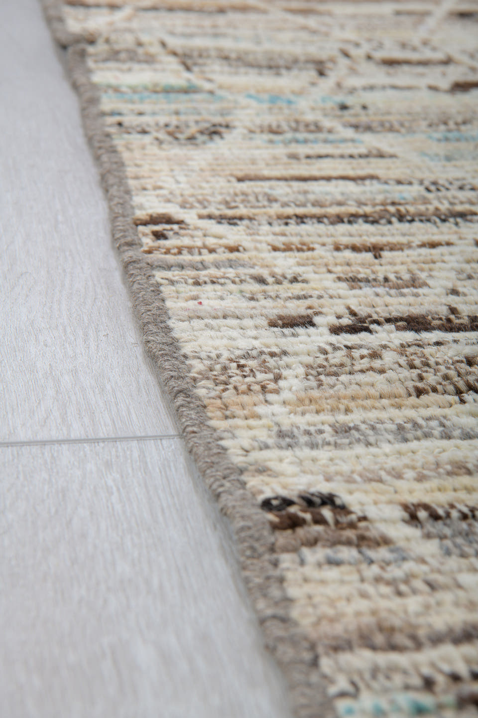 6' x 9' one-of-a-kind handmade vintage Tulu medium size rug. Color palette: ivory, taupe, brown, sky_blue, camel, slate