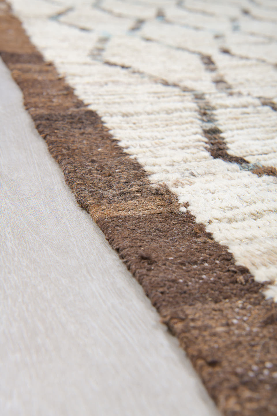 10' x 12' one-of-a-kind handmade vintage Tulu large size rug. Color palette: ivory, brown, charcoal, taupe, faint blue