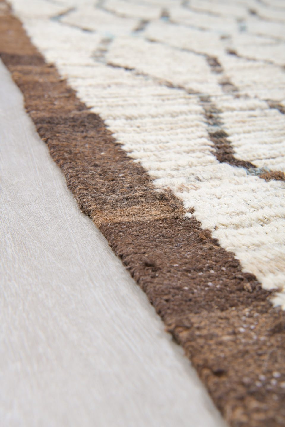 10' x 12' one-of-a-kind handmade vintage Tulu large size rug. Color palette: ivory, brown, charcoal, taupe, faint blue