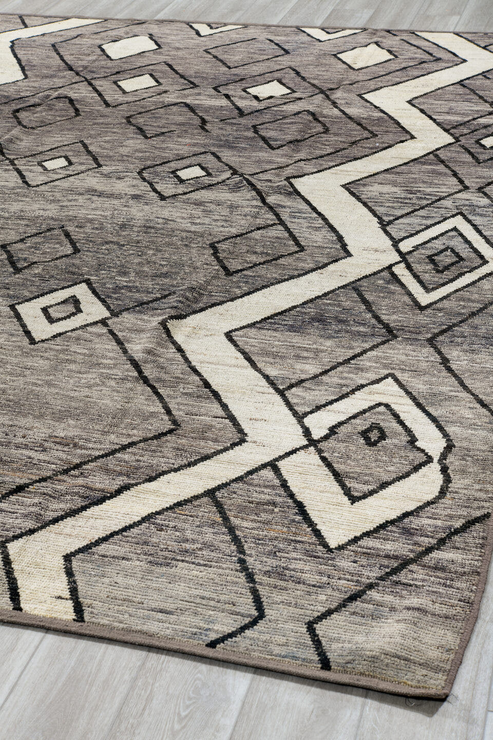 9' x 11' one-of-a-kind handmade vintage Tulu large size rug. Color palette: gray, ivory, charcoal, black