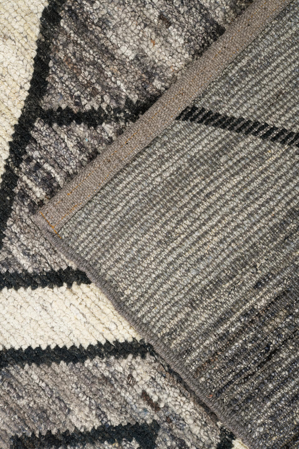 9' x 11' one-of-a-kind handmade vintage Tulu large size rug. Color palette: gray, ivory, charcoal, black