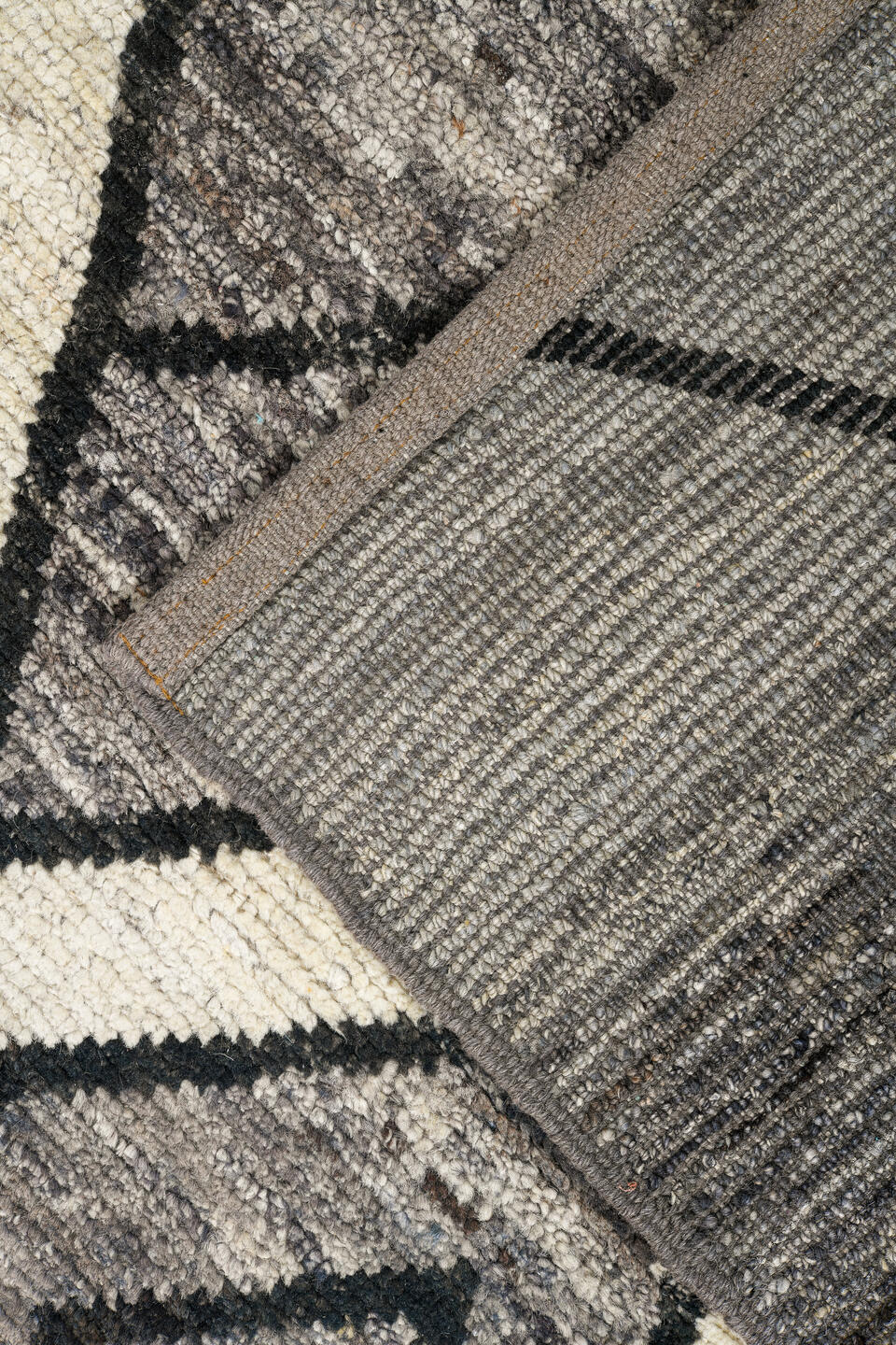 9' x 11' one-of-a-kind handmade vintage Tulu large size rug. Color palette: gray, ivory, charcoal, black