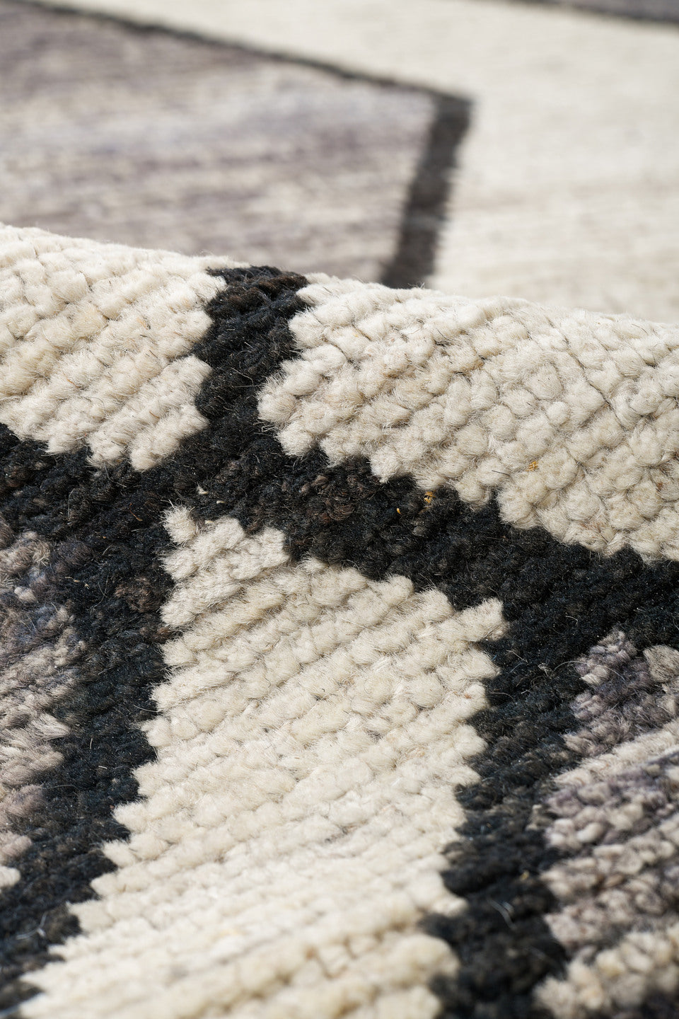 9' x 11' one-of-a-kind handmade vintage Tulu large size rug. Color palette: gray, ivory, charcoal, black