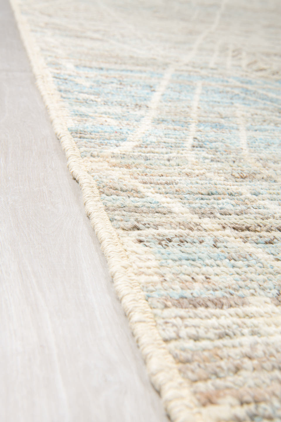 12' x 14' one-of-a-kind handmade vintage Tulu oversize rug. Color palette: ivory, taupe, light blue, beige, gray