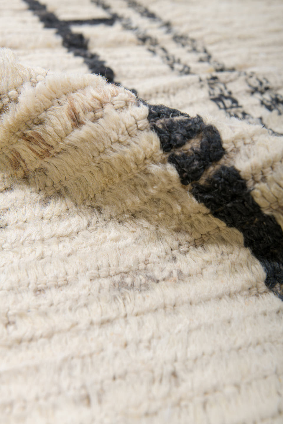 9' x 12' one-of-a-kind handmade vintage Tulu large size rug. Color palette: ivory, black, charcoal, taupe, gray, beige