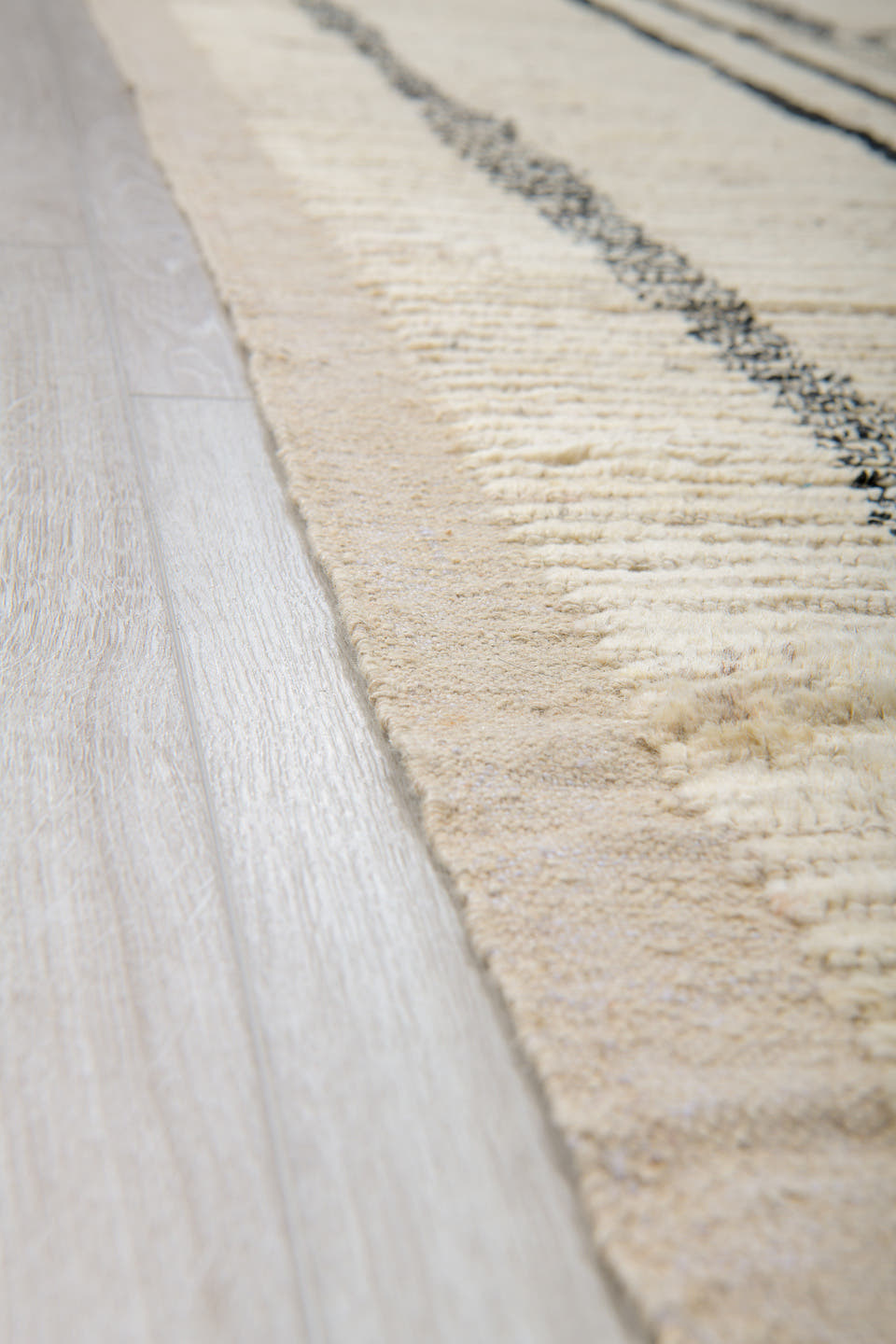 9' x 12' one-of-a-kind handmade vintage Tulu large size rug. Color palette: ivory, black, charcoal, taupe, gray, beige