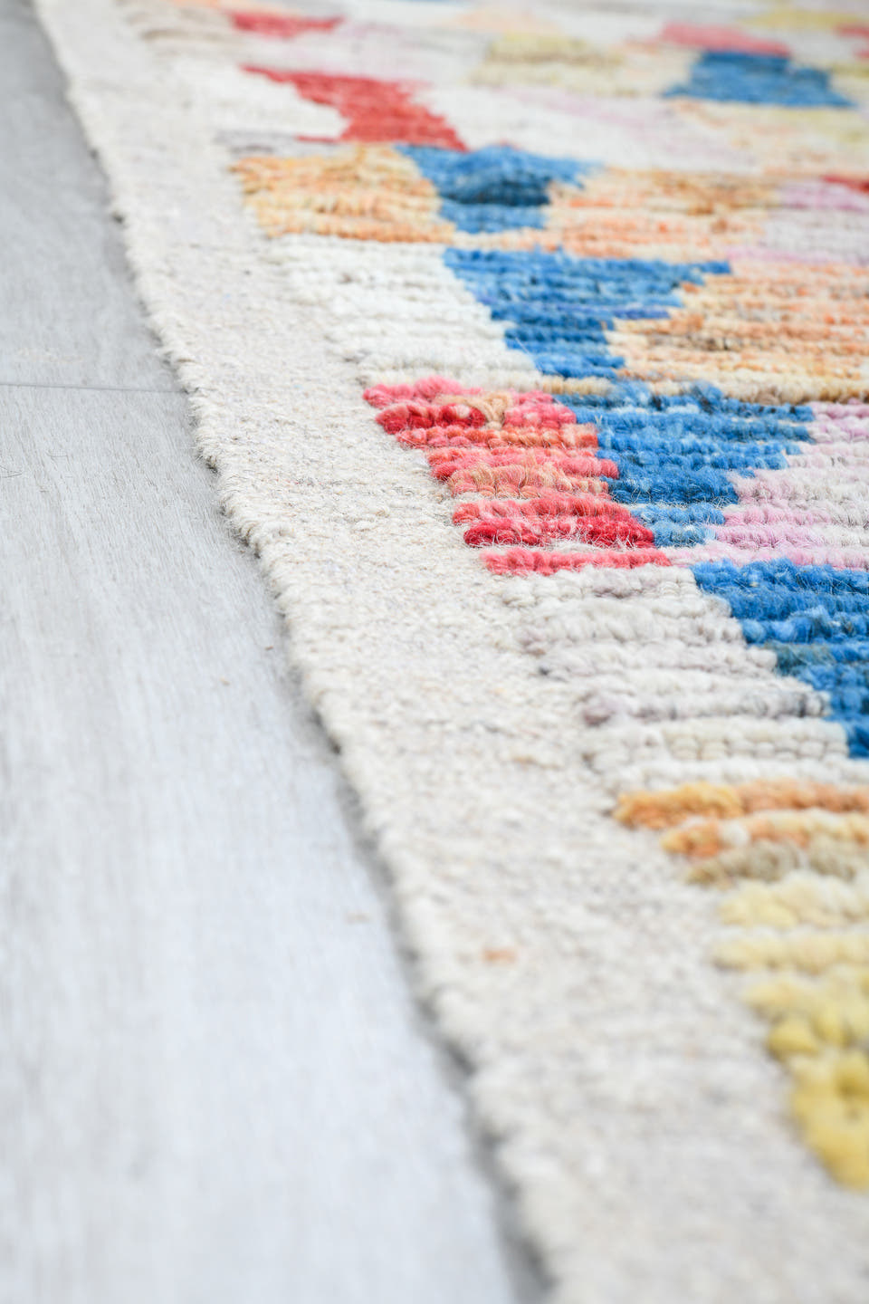 10' x 11' one-of-a-kind handmade vintage Tulu large size rug. Color palette: ivory, sky blue, coral, gold, blush, taupe