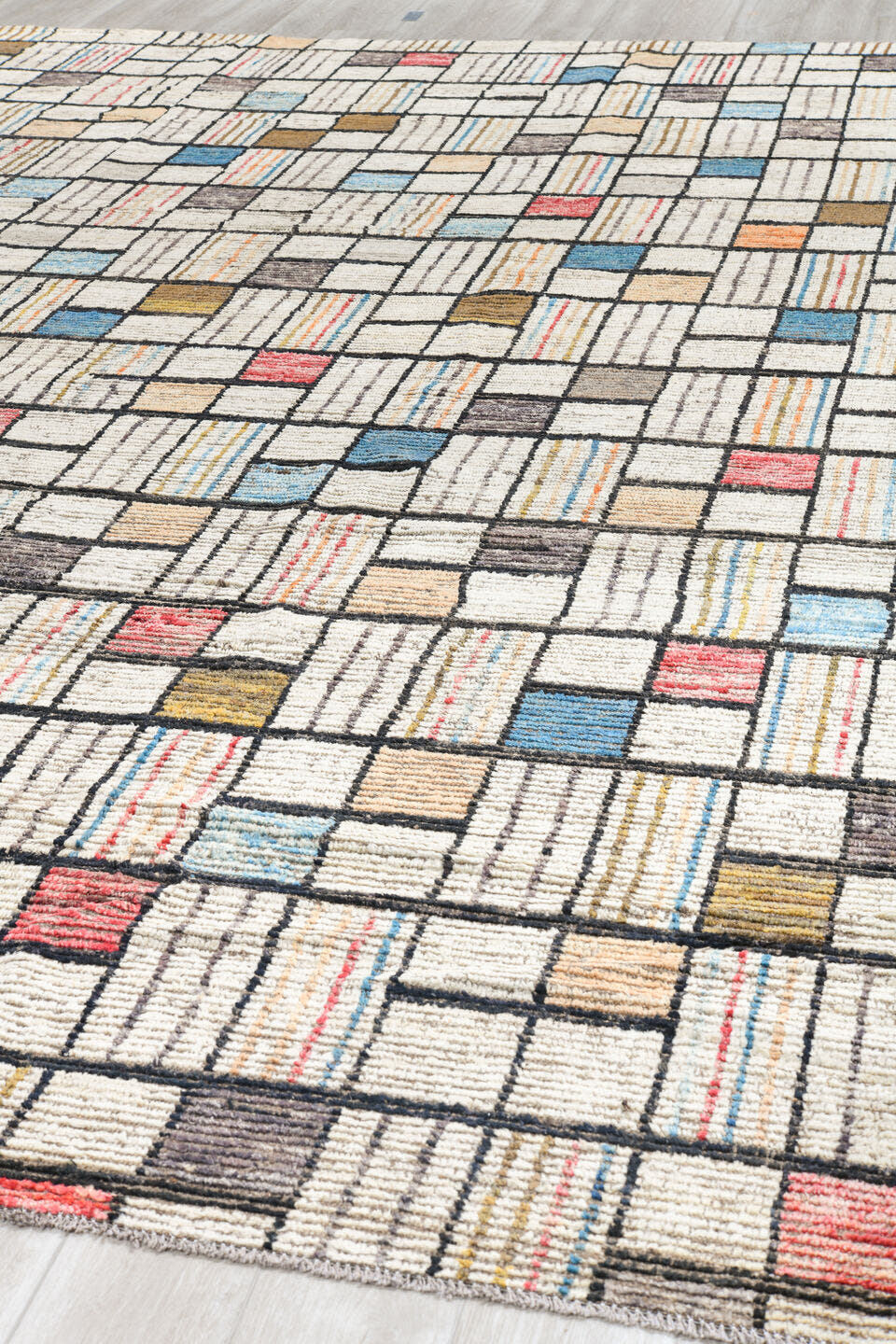 12' x 15' one-of-a-kind handmade vintage Tulu oversize rug. Color palette: ivory, charcoal, taupe, sky blue, coral, camel