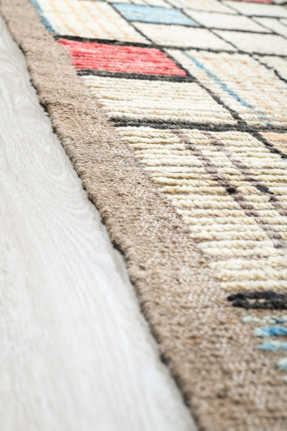 12' x 15' one-of-a-kind handmade vintage Tulu oversize rug. Color palette: ivory, charcoal, taupe, sky blue, coral, camel