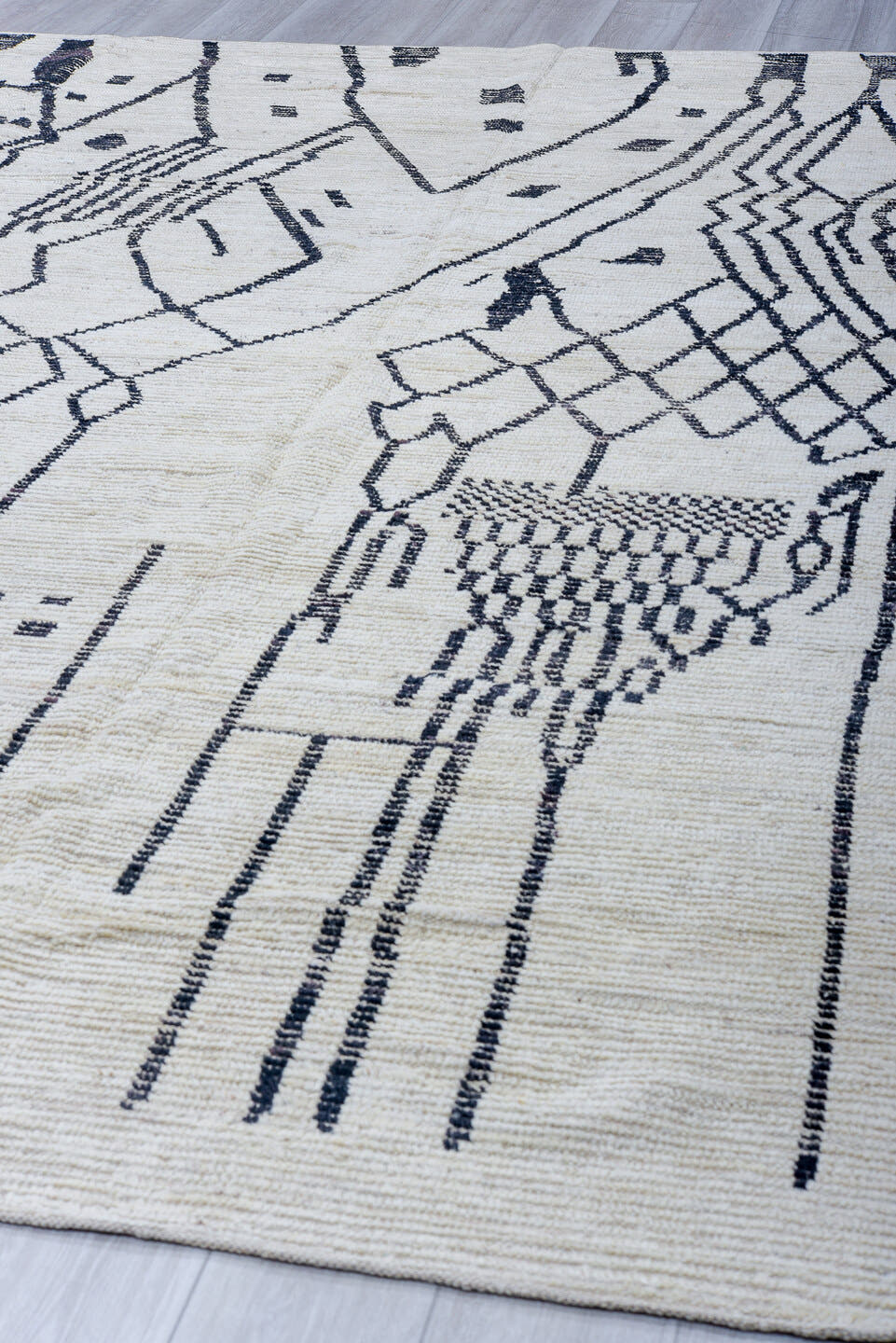 9' x 11' one-of-a-kind handmade vintage Tulu large size rug. Color palette: ivory, charcoal, gray, black
