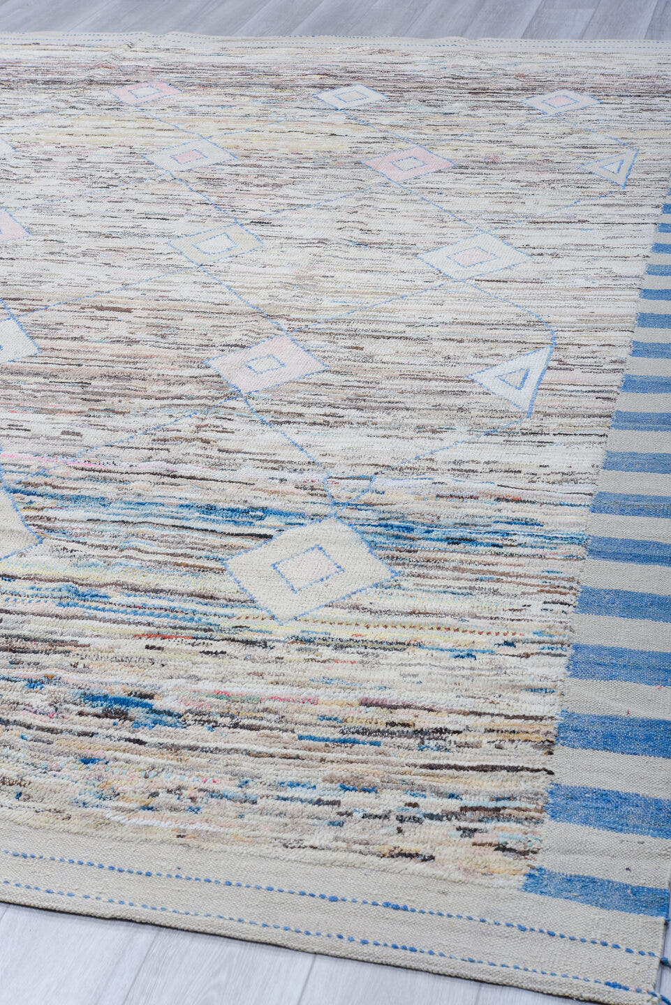 9' x 12' one-of-a-kind handmade vintage Tulu large size rug. Color palette: ivory, sky blue, taupe, brown, blush, gray