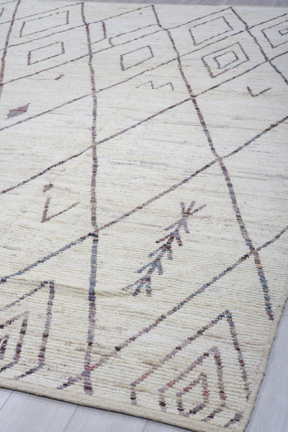 10' x 13' one-of-a-kind handmade vintage Tulu large size rug. Color palette: ivory, charcoal, taupe, brown, gray, black
