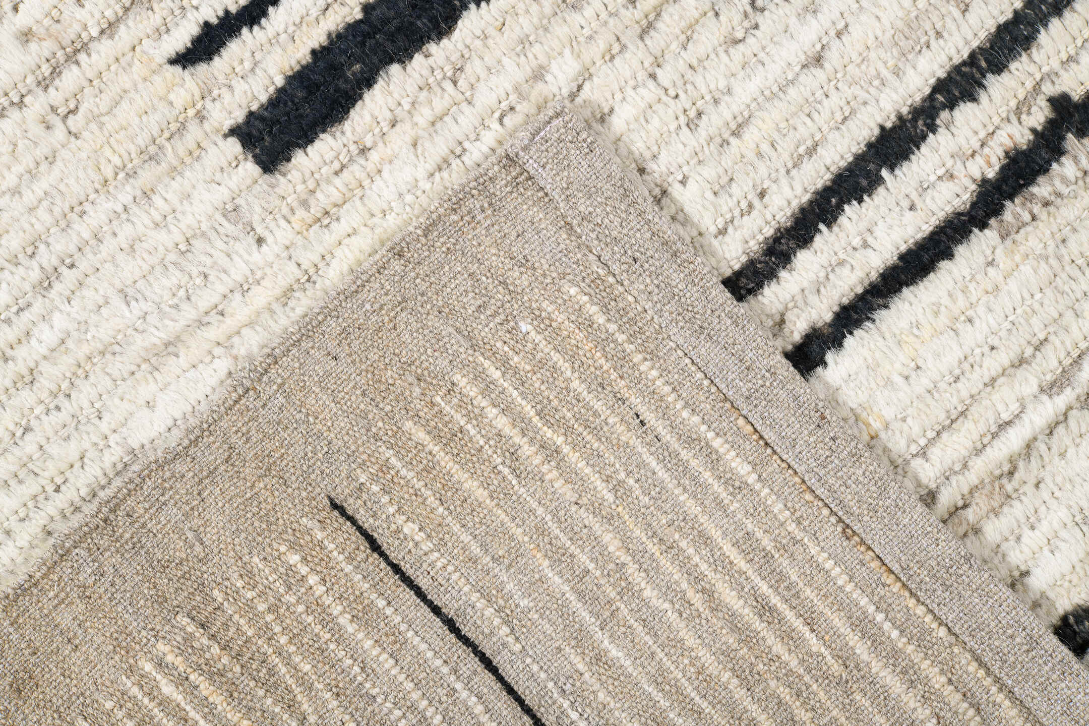 8' x 12' one-of-a-kind handmade vintage Tulu large size rug. Color palette: ivory, charcoal, taupe, gray, black, beige