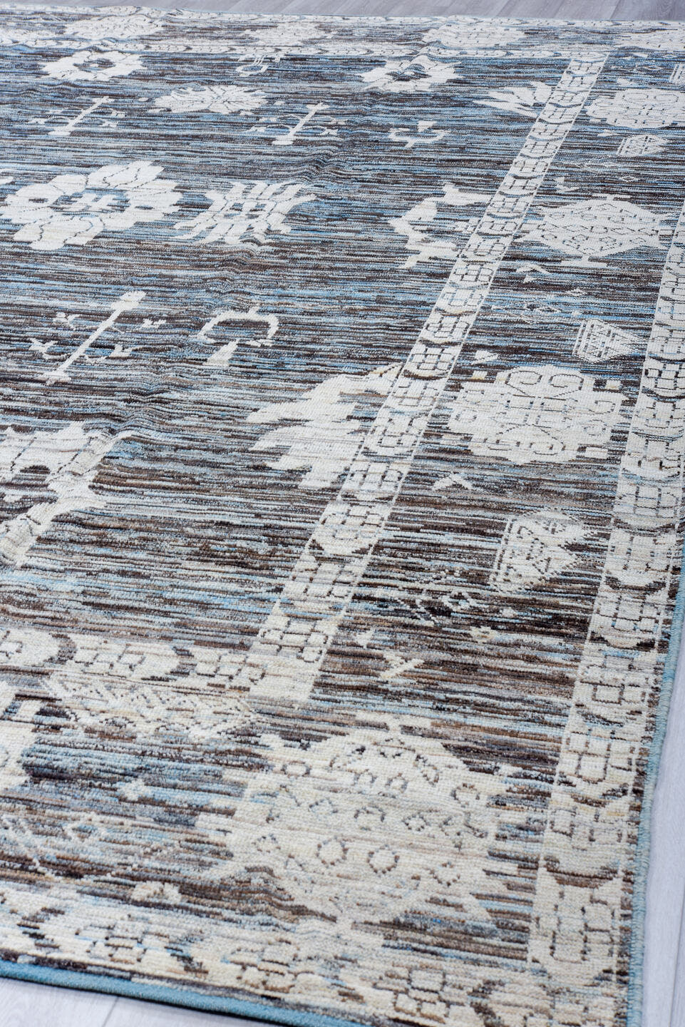 9' x 14' one-of-a-kind handmade vintage Tulu large size rug. Color palette: charcoal, ivory, sky blue, slate, cream, gray